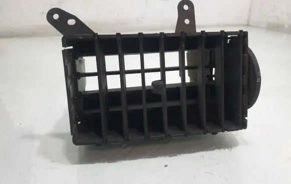 Chrysler Town & Country V Dash center air vent grill 05028729AA