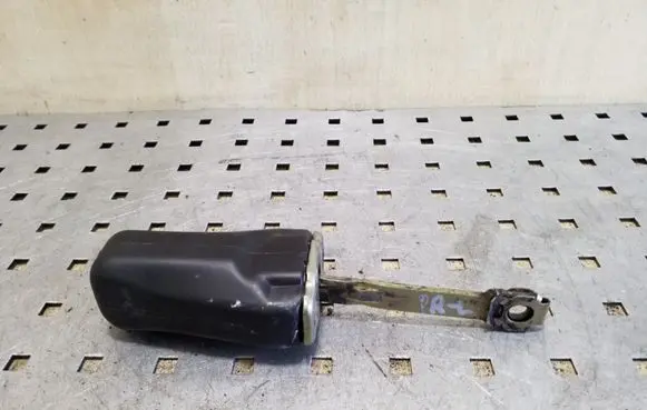 Front door check strap stopper