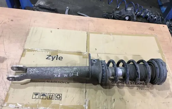 BMW M5 Front shock absorber with coil spring 2284045