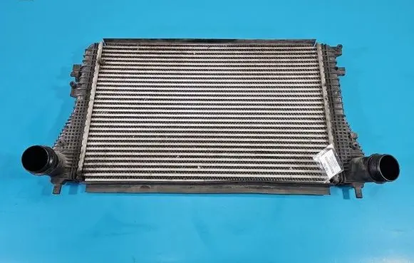 Volkswagen Jetta VI Intercooler radiator 1K0145803BM IMPRK1595251