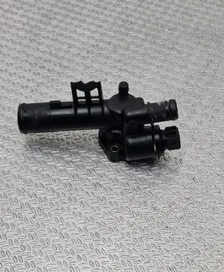 Thermostat/thermostat housing