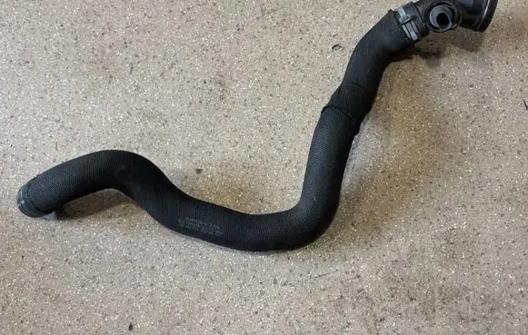 Volkswagen Golf VIII Engine coolant pipe/hose 5Q0522051DE