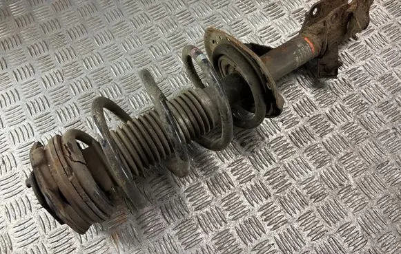 Front shock absorber with coil spring