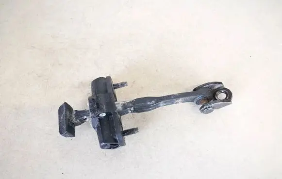 Ford Fiesta Front door check strap stopper 8a6aa23500ab 8a6aa23500-ab