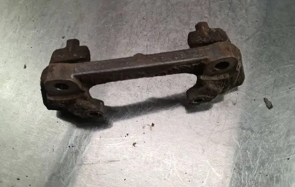 Volvo V70 Front Brake Caliper Pad/Carrier 9209723