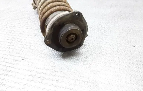 Volkswagen Caddy Front shock absorber with coil spring