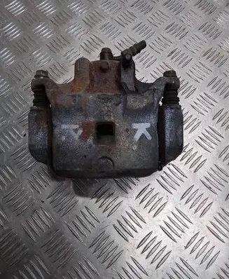Nissan Juke I F15 Front brake caliper