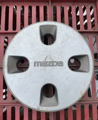 Mazda 323 Original wheel cap 6778