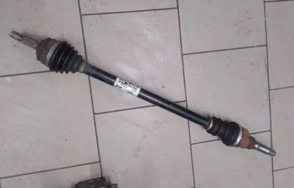 Peugeot 208 I Front driveshaft 9803959680
