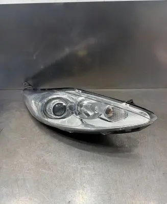 Ford Fiesta Headlight/headlamp 8A6113W029CG 1LE24704506