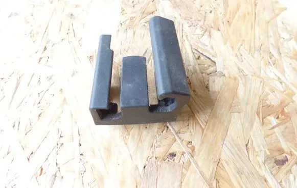 Subaru Legacy Front driver seat rail trim 