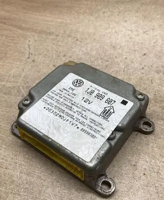 Volkswagen PASSAT B5 Airbag control unit/module 1J0909607 5WK4199