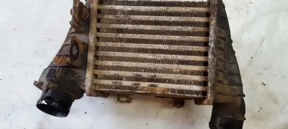 Volkswagen Golf III Intercooler radiator 1231877