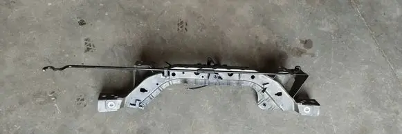 Top upper radiator support slam panel