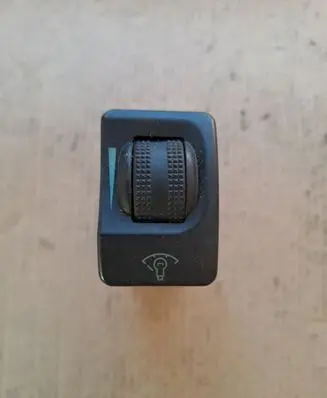 Panel lighting control switch