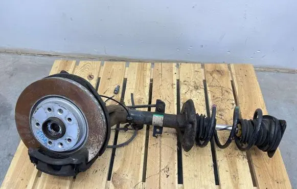 Front shock absorber with coil spring