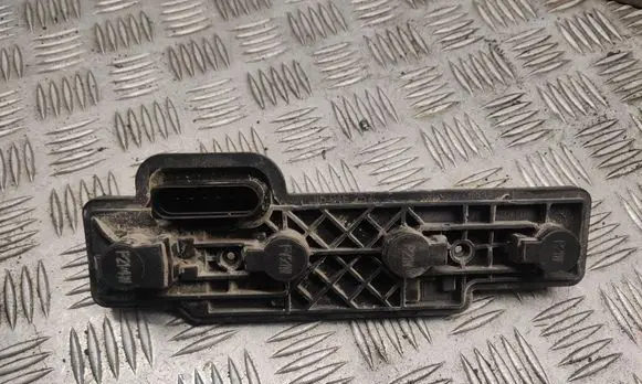 Tail light bulb cover holder