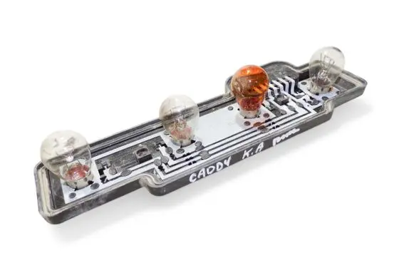 Tail light bulb cover holder