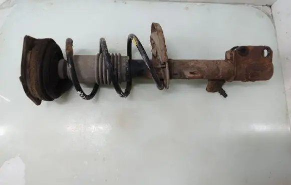 Nissan Micra Front shock absorber with coil spring