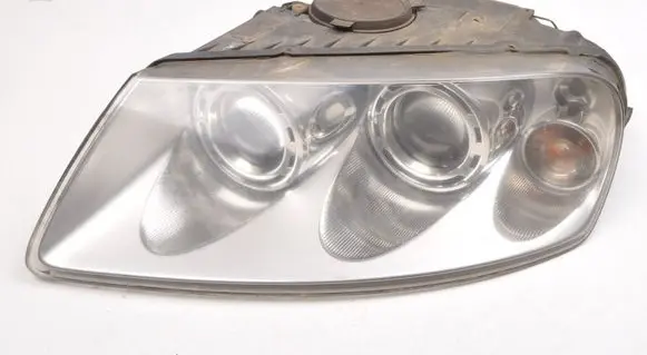 Volkswagen Touareg I Headlight/headlamp 7L6941015BK