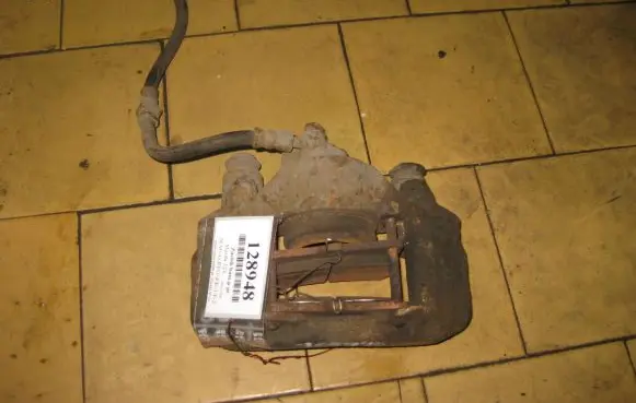 Mazda 323 F Front brake caliper
