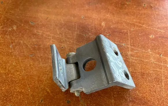 Rear door upper hinge