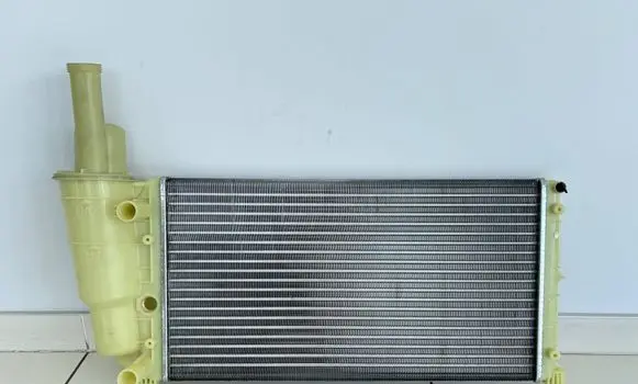 Lancia Y 840 Coolant radiator 46465021 7774531