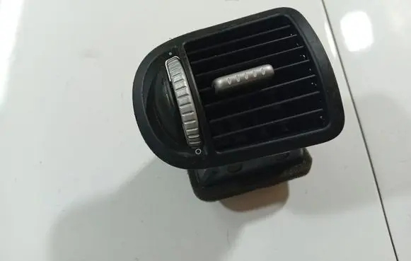 Dash center air vent grill