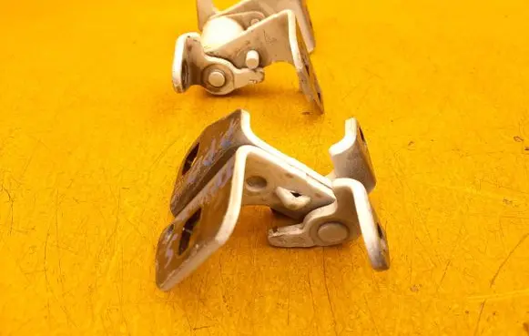 Tesla Model S Front door upper hinge 