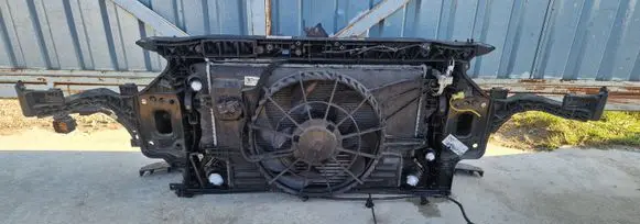 Radiator support slam panel
