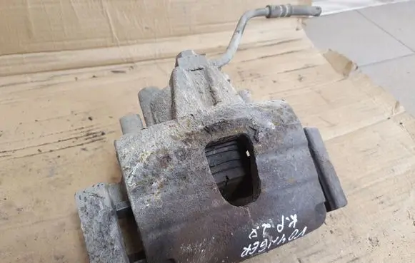 Chrysler Grand Voyager IV Front brake caliper