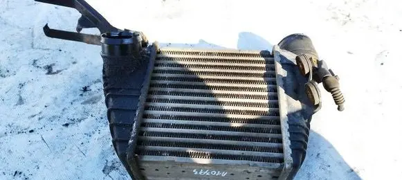 Volkswagen Golf IV Intercooler radiator 1J0145803