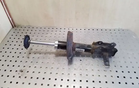 Opel Astra J Front shock absorber/damper 13354025