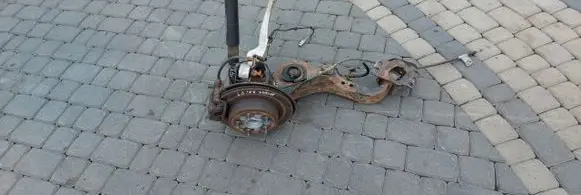Rear wheel hub spindle/knuckle