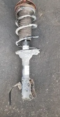 Front shock absorber with coil spring