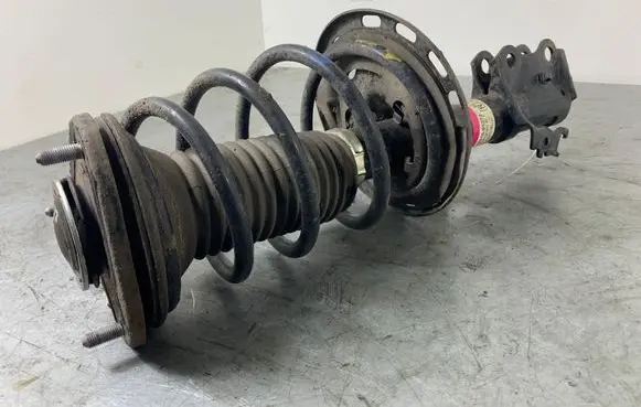 Front shock absorber with coil spring