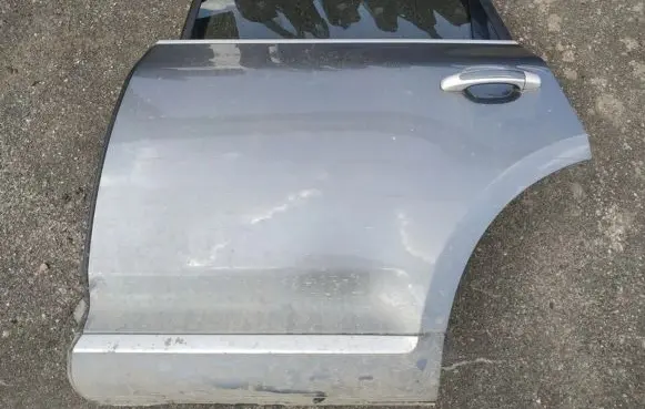 Porsche Cayenne (9PA) Rear door pilkos