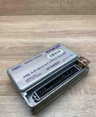 Hyundai Coupe ABS control unit/module 9566129000