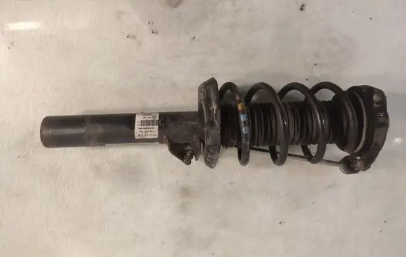 Volkswagen Jetta V Front shock absorber with coil spring 1T0413031G