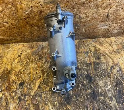 Mercedes-Benz E W124 Oil filter mounting bracket 6011840025 6011840602