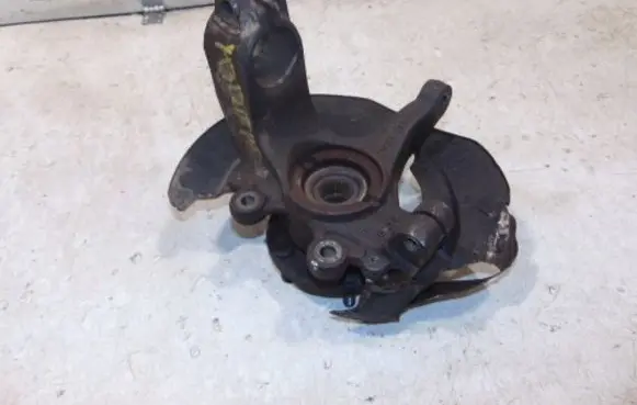 Front wheel hub spindle knuckle