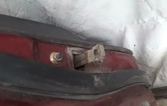 Mazda 626 Rear door check strap stopper