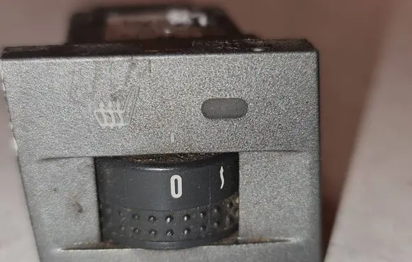 Seat heating switch