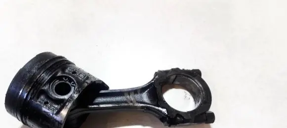 Nissan Almera Piston with connecting rod 12157j1