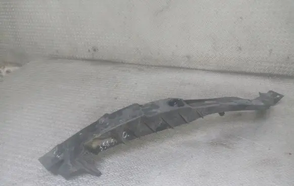Opel Astra J Headlight/headlamp mounting bracket 13287640
