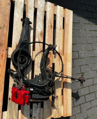 Rear wheel hub spindle/knuckle