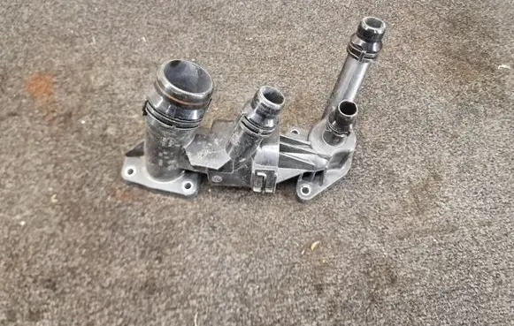 Thermostat/thermostat housing