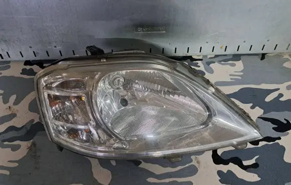 Dacia Logan I Headlight/headlamp 8200744754 00118976