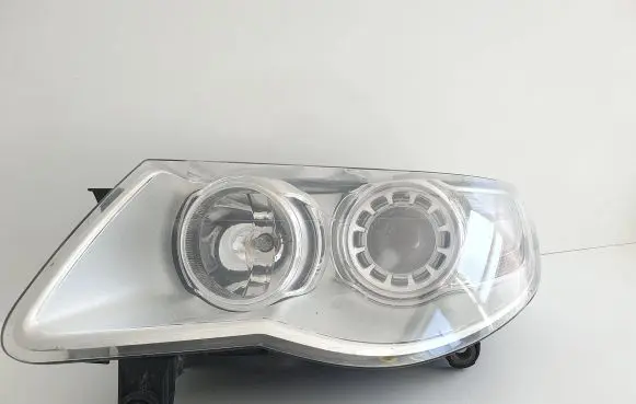 Volkswagen Touareg I Headlight/headlamp 16464500