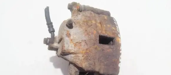 Nissan Almera N16 Front brake caliper